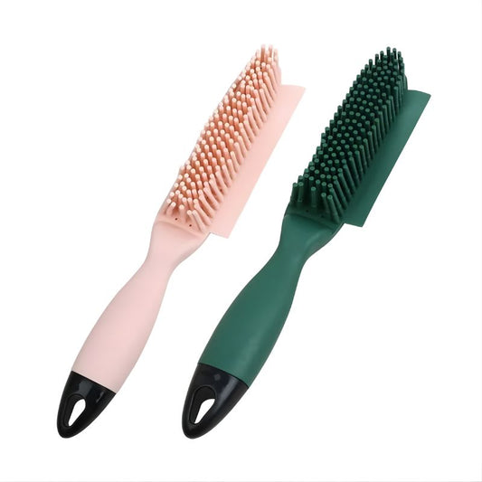 Two hairbrushes, one pink and one green, on a white background