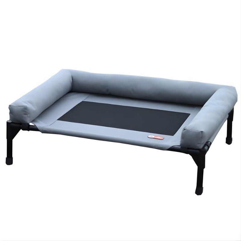 Gray pet bed with black mesh bottom on a white background