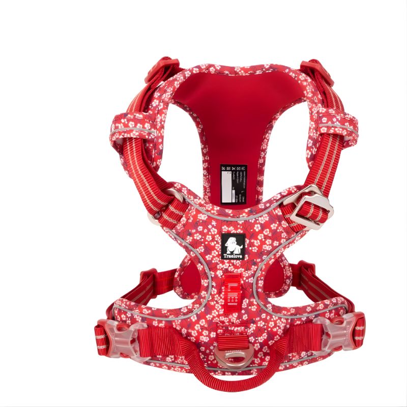 Red floral-patterned dog harness on a white background