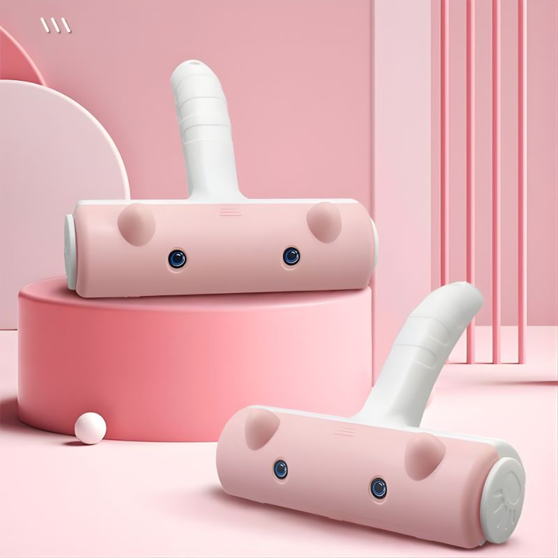 Pink and white cleaning tool on a pink background